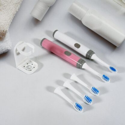 12712 Adult Waterproof Electric Toothbrush Strong Sonic Charging with 4 Toothbrush Head and a toothbrush holder - Image 3