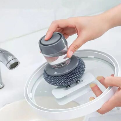 Versatile soap dispensing dish brush, easy to use and refill